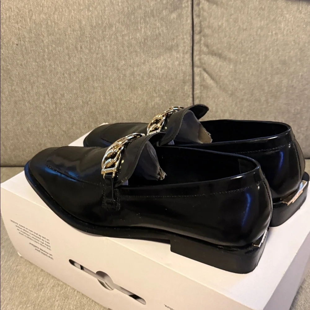 Aldo Black Leather Loafers with Gold Chain Trim